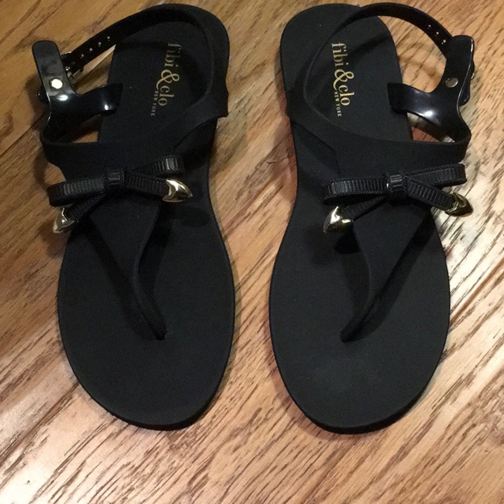 Black sandals with cute bow
